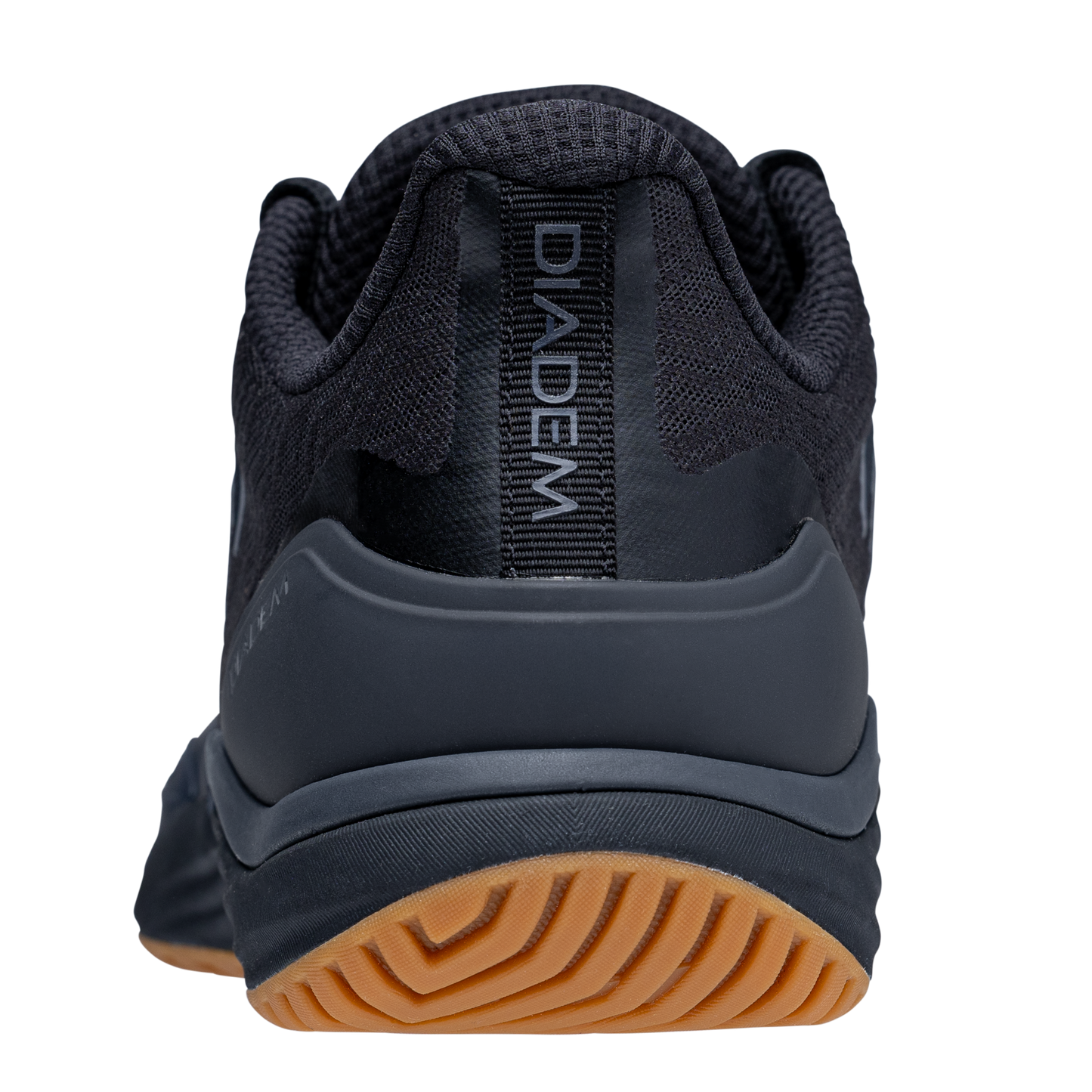 A close-up rear view of the Diadem Court Burst by Diadem Sports, featuring a black mesh upper, gray heel counter, brown rubber sole, and DIADEM in white on the heel tab—perfect for pickleball or tennis fans. Plain white background.