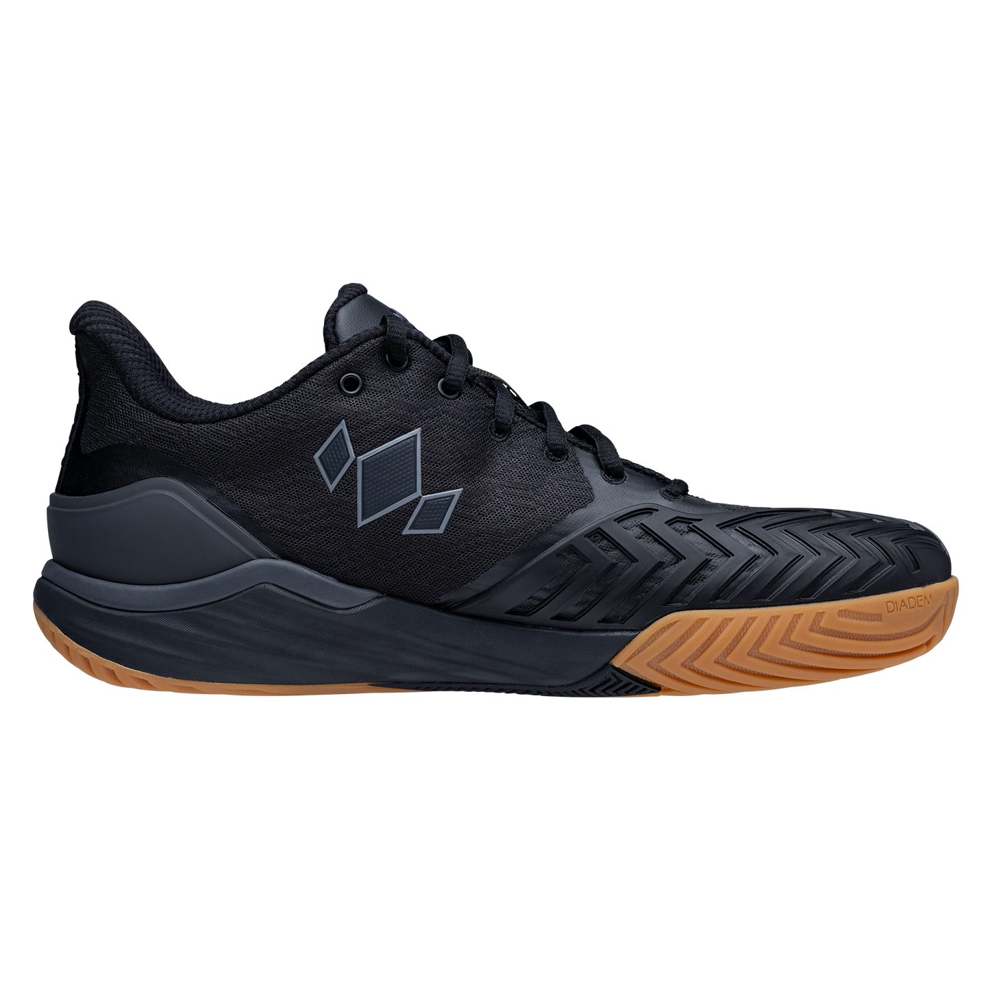 The Diadem Sports Diadem Court Burst is a black athletic court shoe with a gum-colored sole, textured toe guard, geometric diamond side pattern, black laces, supportive heel, and mesh-like upper. Ideal for pickleball or tennis. Plain light gray background.