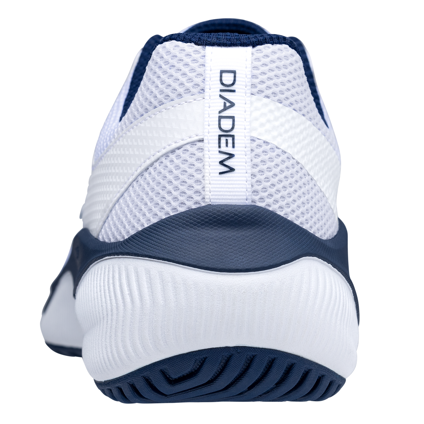 Close-up rear view of the Diadem Sports Diadem Court Flo, a white performance athletic shoe with navy accents. Features include a textured heel, navy sole, blue "DIADEM" strip, and breathable mesh upper. Plain white background.