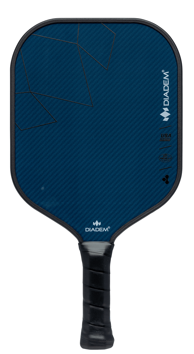 A blue Diadem ROYAL Warrior BluCore MAX 14MM paddle by Royal Pickleball features a black grip, angled black lines on the upper half, and white branding and certification logos on the right side, all set against a plain white background.