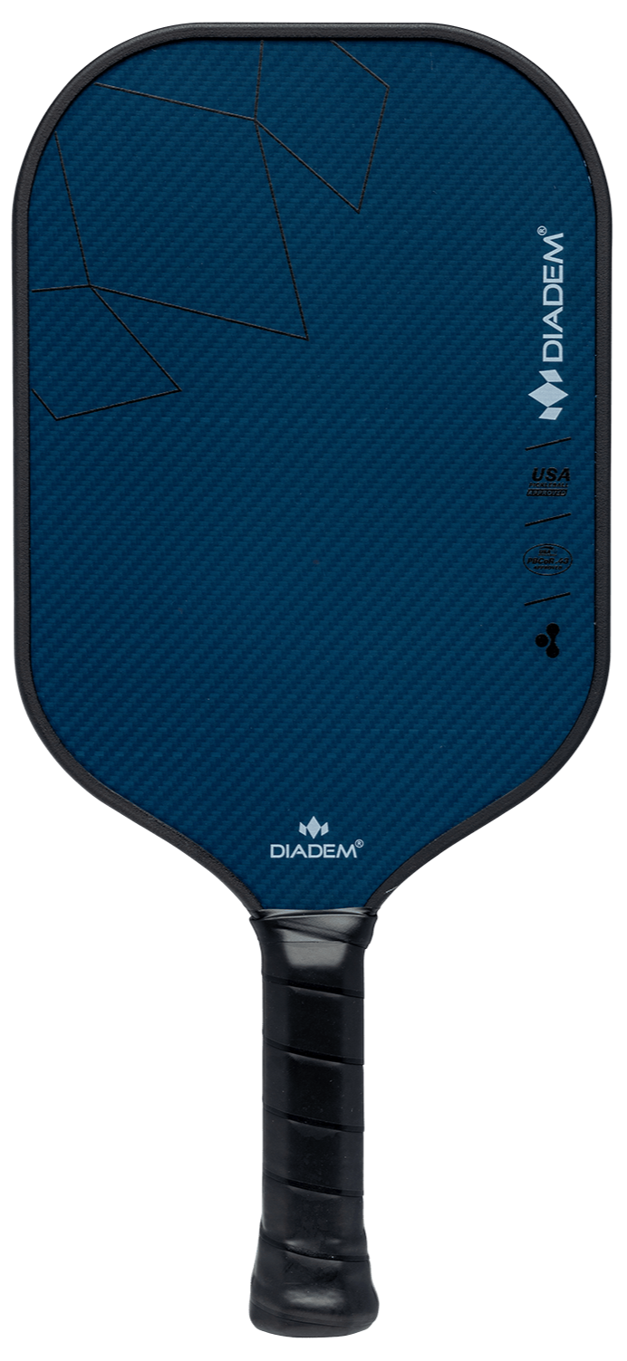 The Royal Pickleball Diadem ROYAL Warrior BluCore STANDARD 14MM paddle in blue has a black handle, Kevlar Carbon Fiber Matrix surface, diagonal lines, geometric designs, and white logos including Diadem and USA Pickleball Approved on a plain white background.