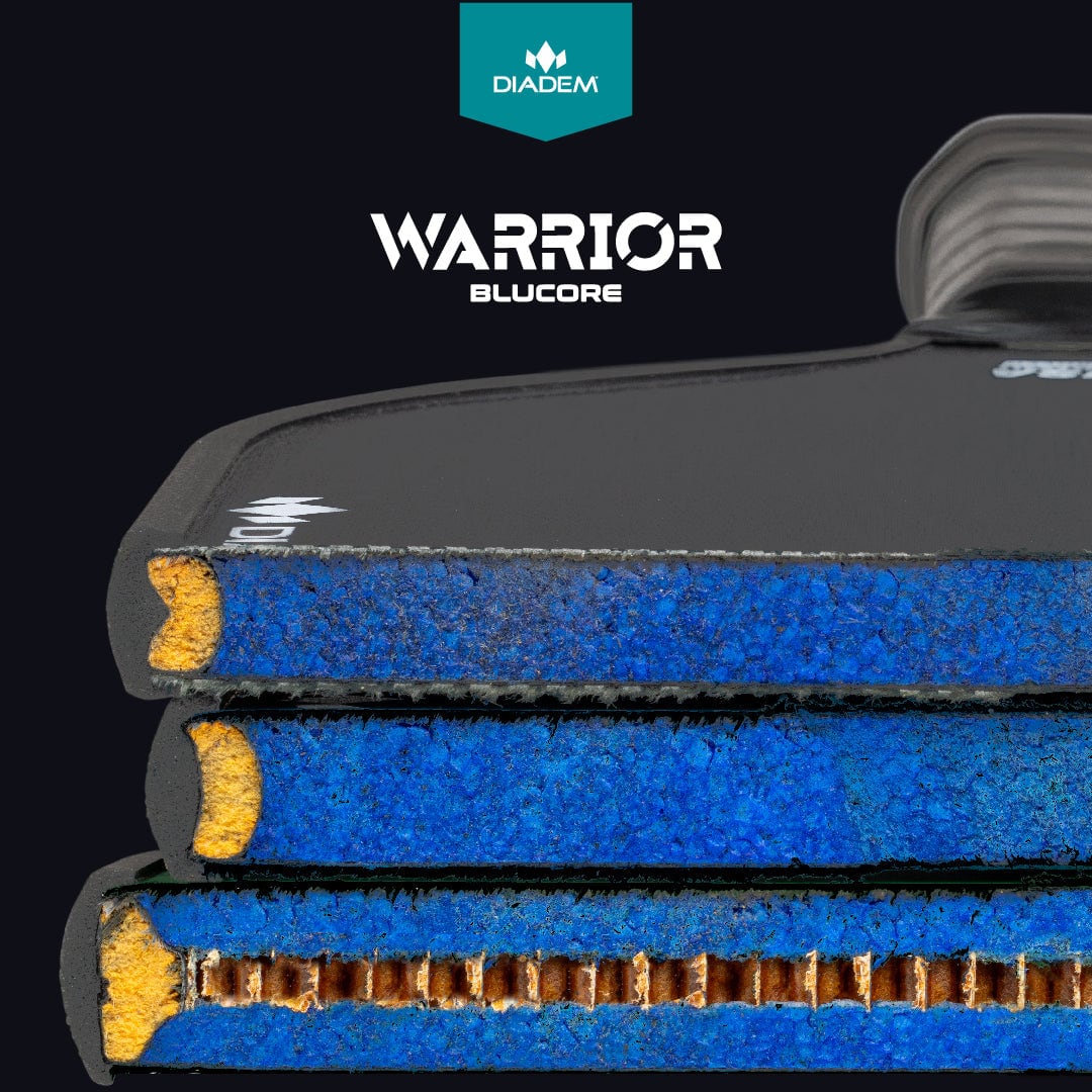 A close-up cross-section of three black pickleball paddles reveals blue and yellow layers. The top paddle, labeled Diadem ROYAL Warrior BluCore STANDARD 14MM by Royal Pickleball, displays BluCore Technology beneath a turquoise logo on a black background.
