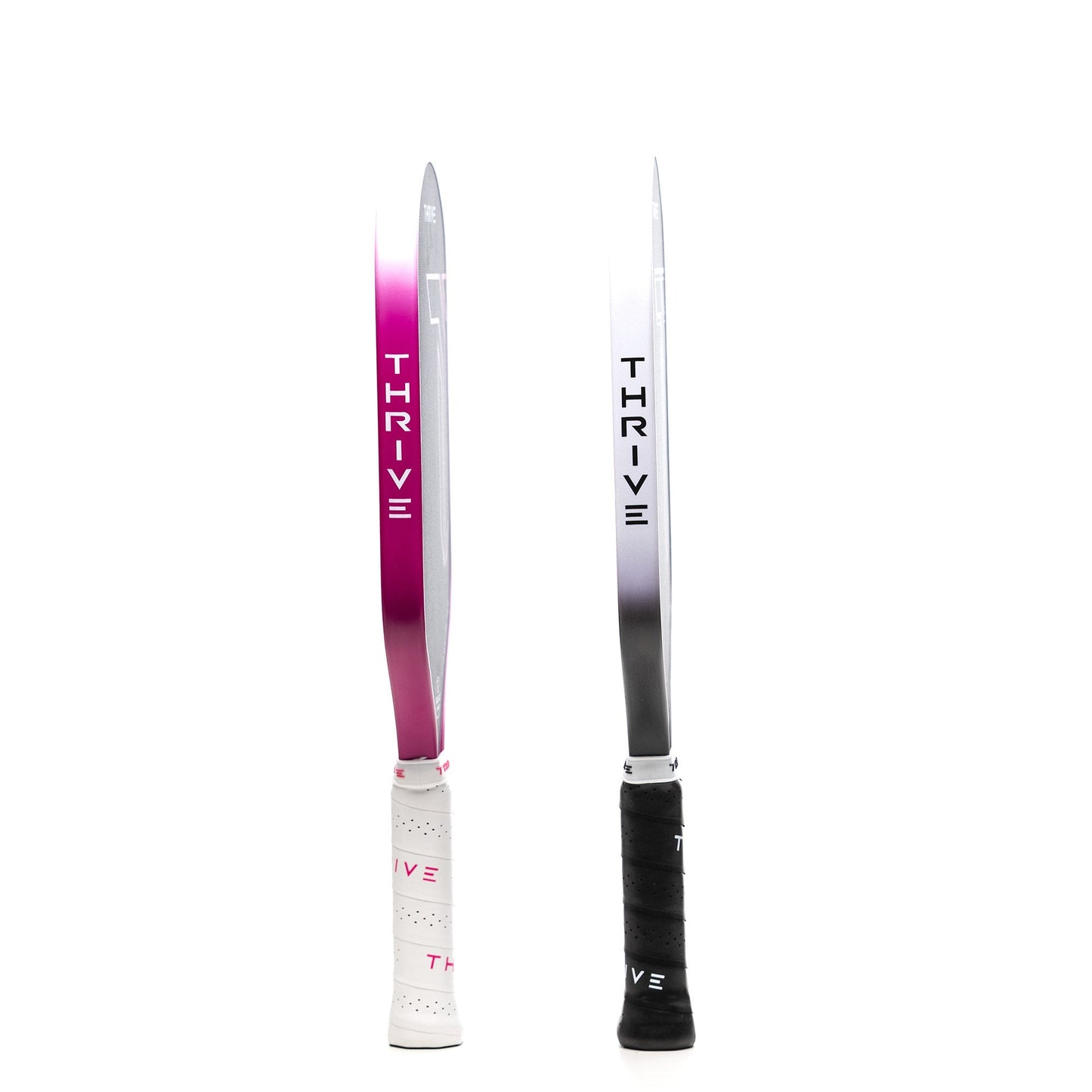 Two FURY Hybrid 15.5 MM (GEN 3.5 POWER SERIES) paddles from Thrive Pickleball stand upright: the left fades magenta to silver with a white handle, the right fades black to silver with a black handle and floating core. Both say THRIVE on the blade.