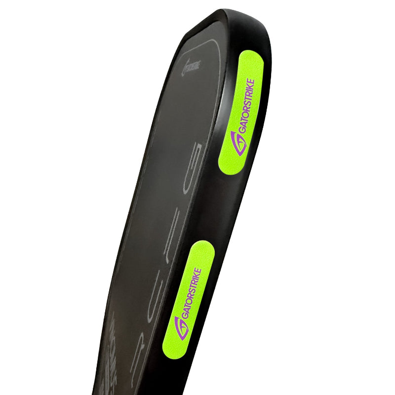 Close-up of a black rectangular GATORSTRIKE™ Weight Tape 10 Pack. Neon yellow-green handles feature the GATORSTRIKE logo; subtle graphics and textured finish enhance style and grip. Ideal for pickleball as a unique accessory.