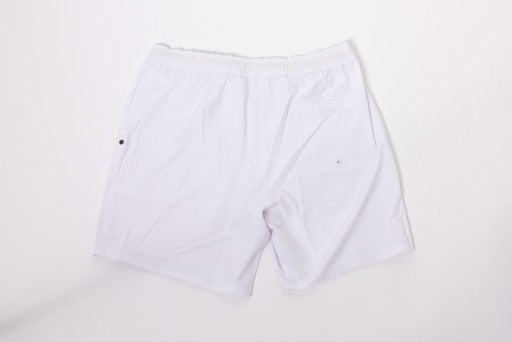 The Thrive Elite Shorts (7 in.) by Thrive Pickleball are plain white, quick-drying shorts with an elastic waistband, two back pockets—right pocket with a small button—and made from lightweight fabric, shown laid flat on a white background.