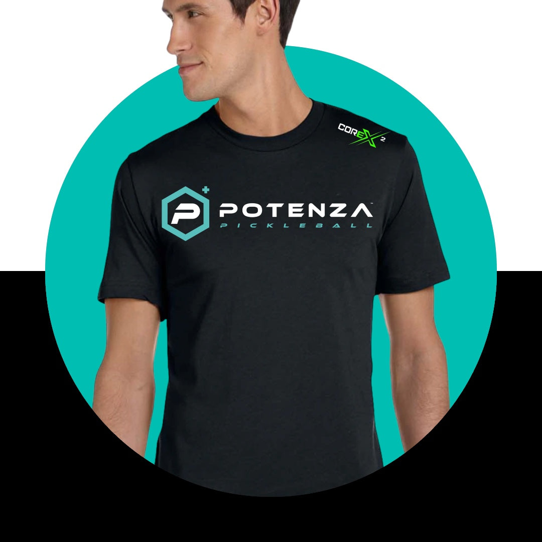 A man sports the Potenza Pickleball Quick-Dry Performance T-Shirt, featuring a white and teal logo on the chest plus a small green shoulder emblem, set against a striking teal-and-black circular backdrop—the ultimate pickleball shirt!.