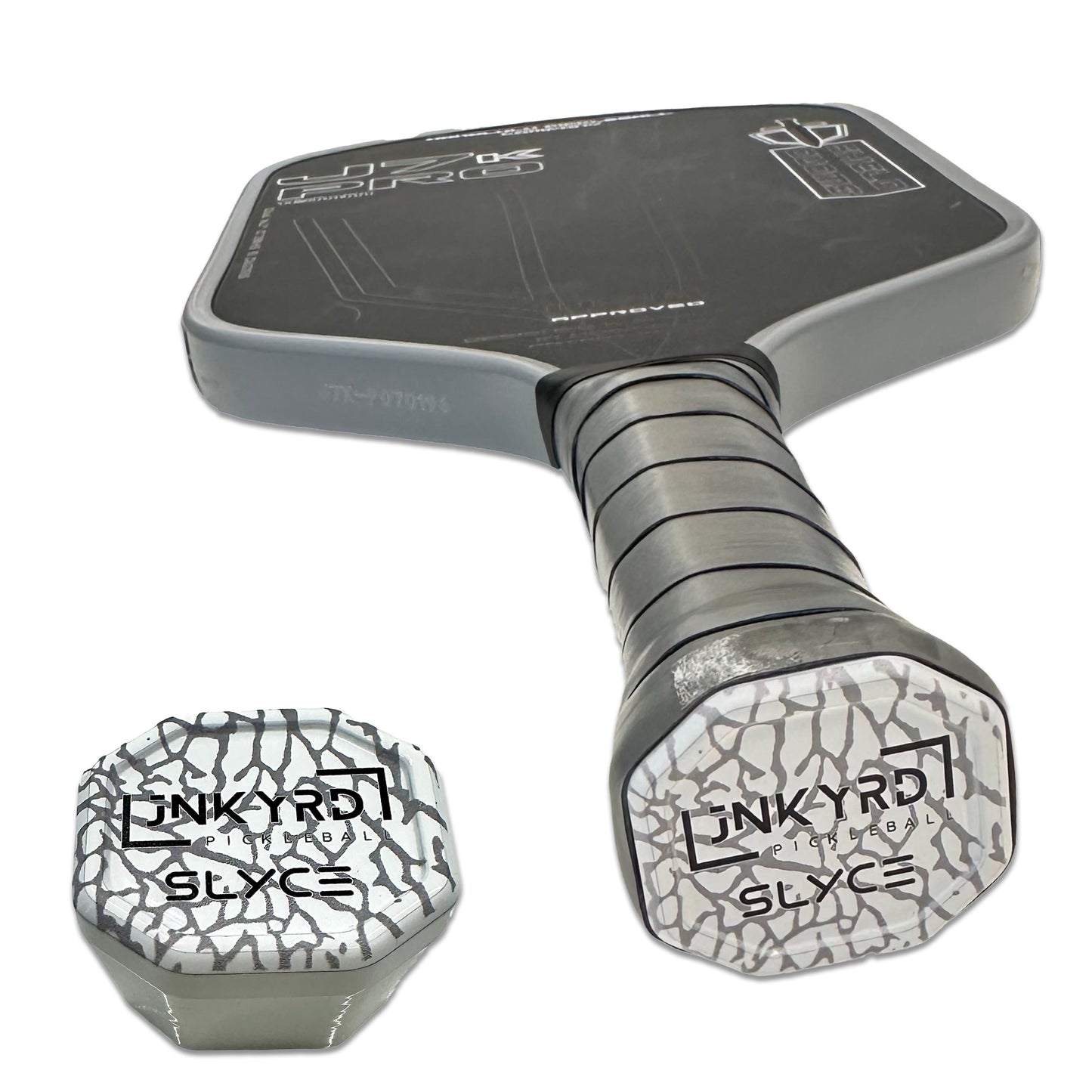 The Slyce Sport Special Edition Junkyard Pickleball SpeedCap (28g, 1.0 oz.) Paddle Performance Enhancer adds comfort and control with a unique grip cap design.