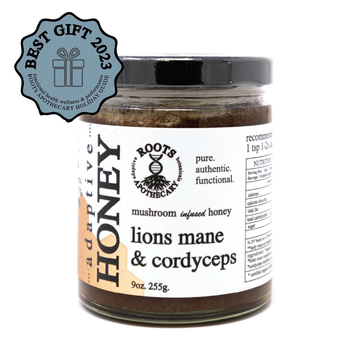 A jar of Roots Apothecary adaptive honey. lion's mane & cordyceps (9oz/255g) features mushroom illustrations and product details on the label, plus a “Best Gift 2023” badge in the top left corner.