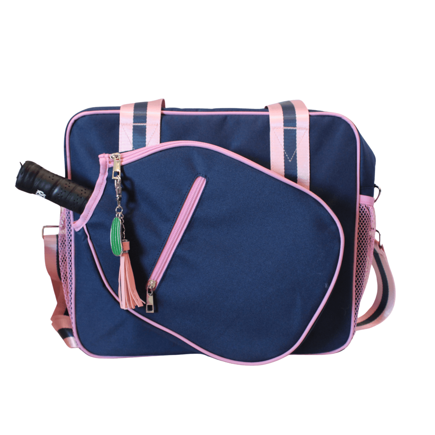The Lola Pickleball Tote Bag by Fresh Pickle is a navy blue bag with pink trim and straps, a large diagonally-shaped front pocket for your racket, decorative tassels and charms on the zipper, and mesh side pockets for extra storage.