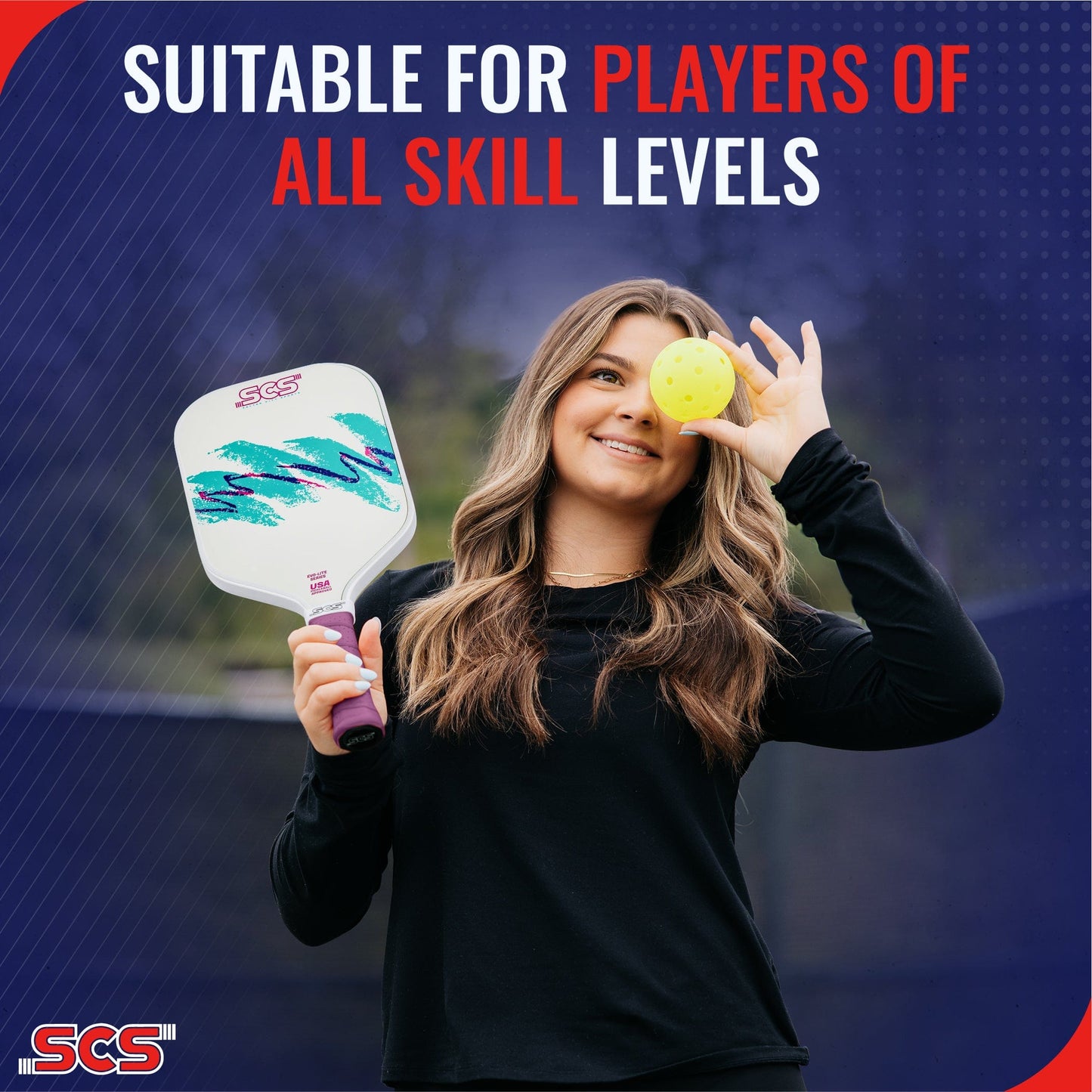 A smiling woman in a black shirt holds the Salted City Sports Nostalgia | Evo-Lite Series pickleball paddle and a yellow ball, covering one eye. The blurred background reads: “SUITABLE FOR PLAYERS OF ALL SKILL LEVELS.” USA Pickleball approved; SCS logo at bottom left.