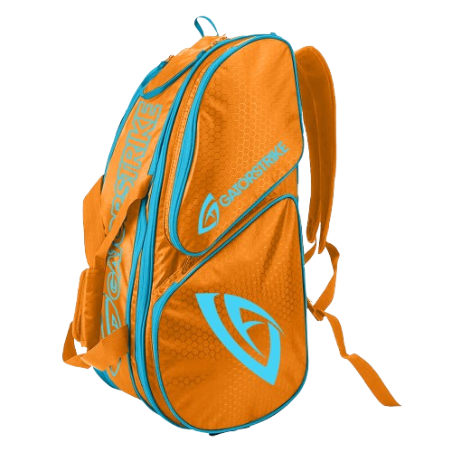 The GATORSTRIKE™ World Tour Backpack Bag by GATORSTRIKE features orange with blue accents, ideal for carrying your paddle bag or accessories for wide-body and elongated paddles.