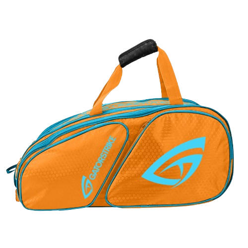 The GATORSTRIKE™ World Tour Backpack Bag by GATORSTRIKE is an orange sports bag with blue zippers and accents, a blue stylized graphic, and the GATORSTRIKE logo. It fits elongated paddles in two zippered compartments. Black padded handle; white background.