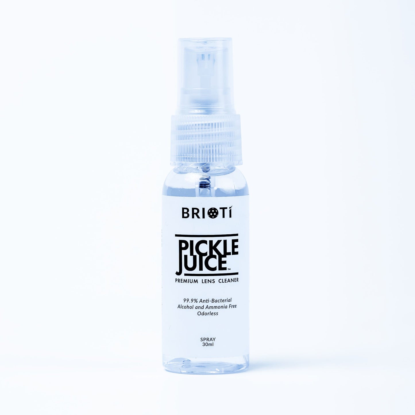 A clear spray bottle labeled "BRIOTI PICKLE JUICE™ Cleaning Kit" stands upright on a plain white background. This 30ml, alcohol-free lens cleaner is 99.9% antibacterial, streak-free, odorless, and ammonia free.