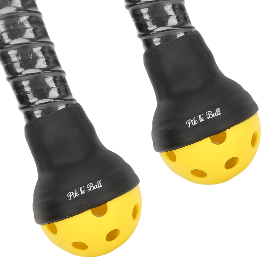 The Pik'le'Ball Ball Retriever by Pik'le'Ball Sports includes two black and yellow paddles with spiral handles and attached yellow perforated balls, making it a unique pickleball ball picker accessory.