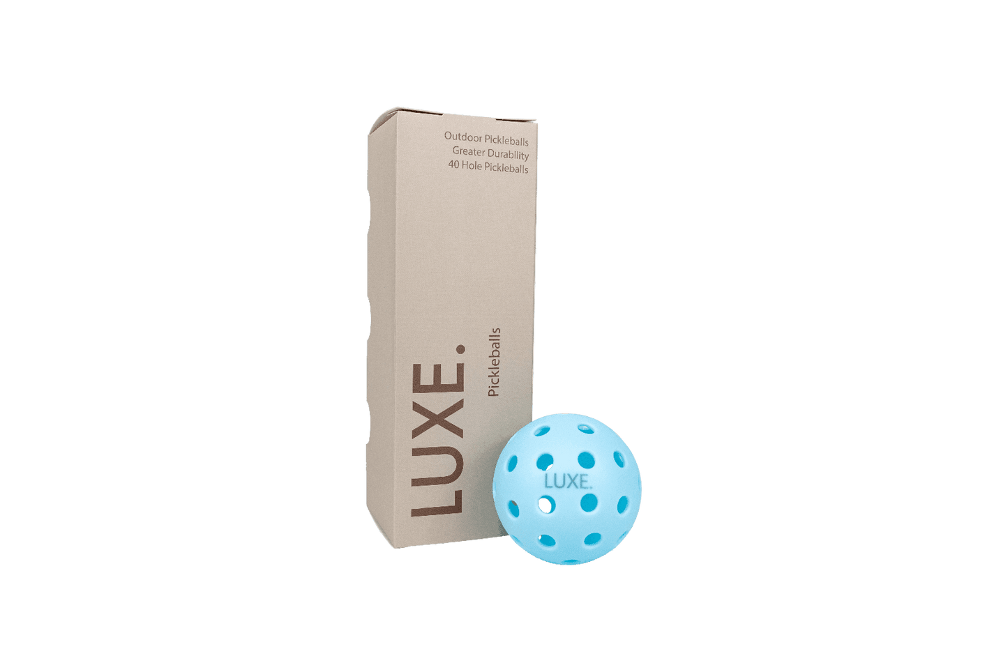 A light brown rectangular LUXE Pickleball box stands upright beside a high-visibility, light blue LUXE Pickleballs - Durable Practice and Tournament Ball with 40 holes. Both are set against a plain white background.