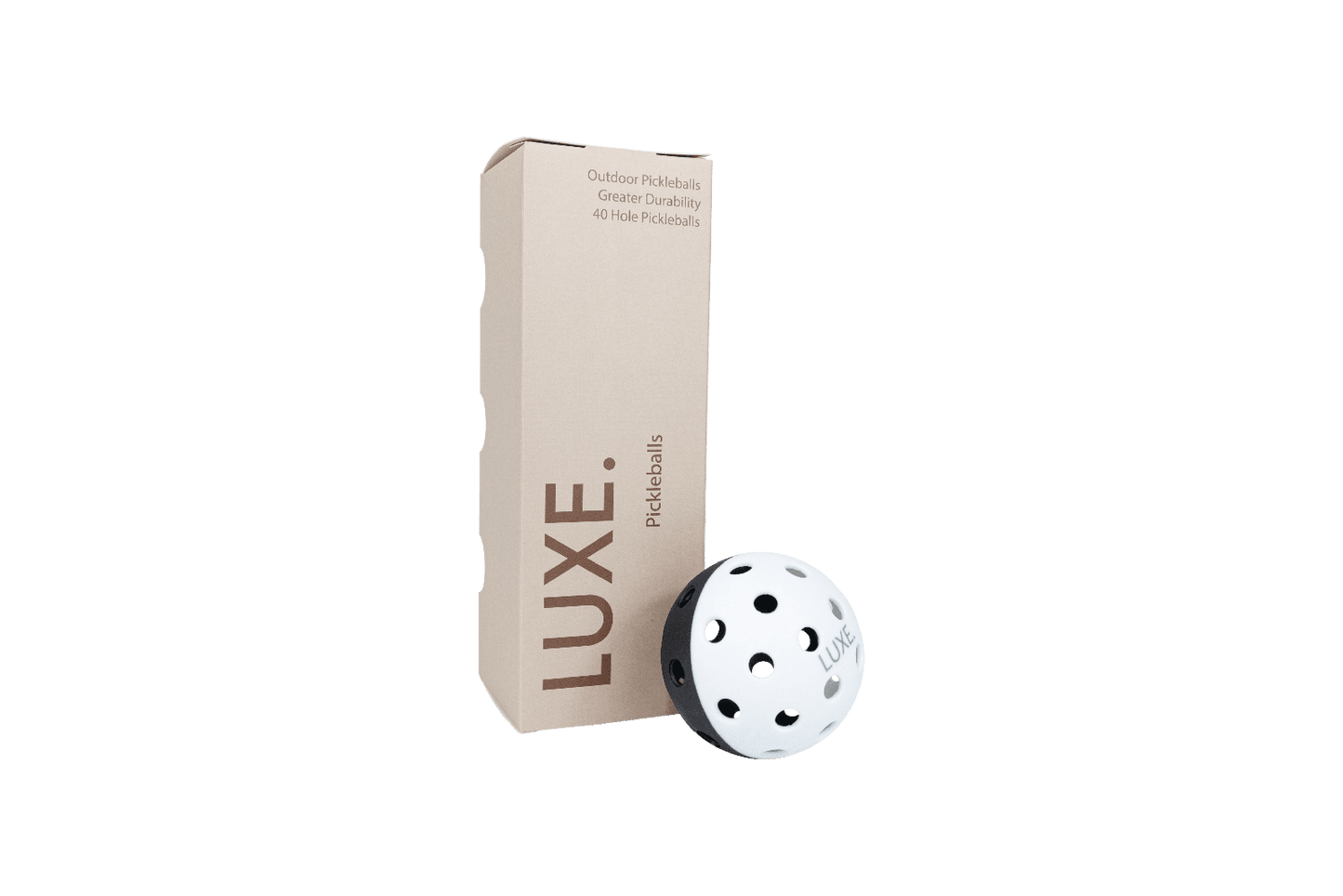 A rectangular brown box labeled LUXE Pickleballs - Durable Practice and Tournament Balls for Indoor and Outdoor Play stands upright beside a white, high-visibility LUXE Pickleball outdoor ball with a 40-hole design against a white background.