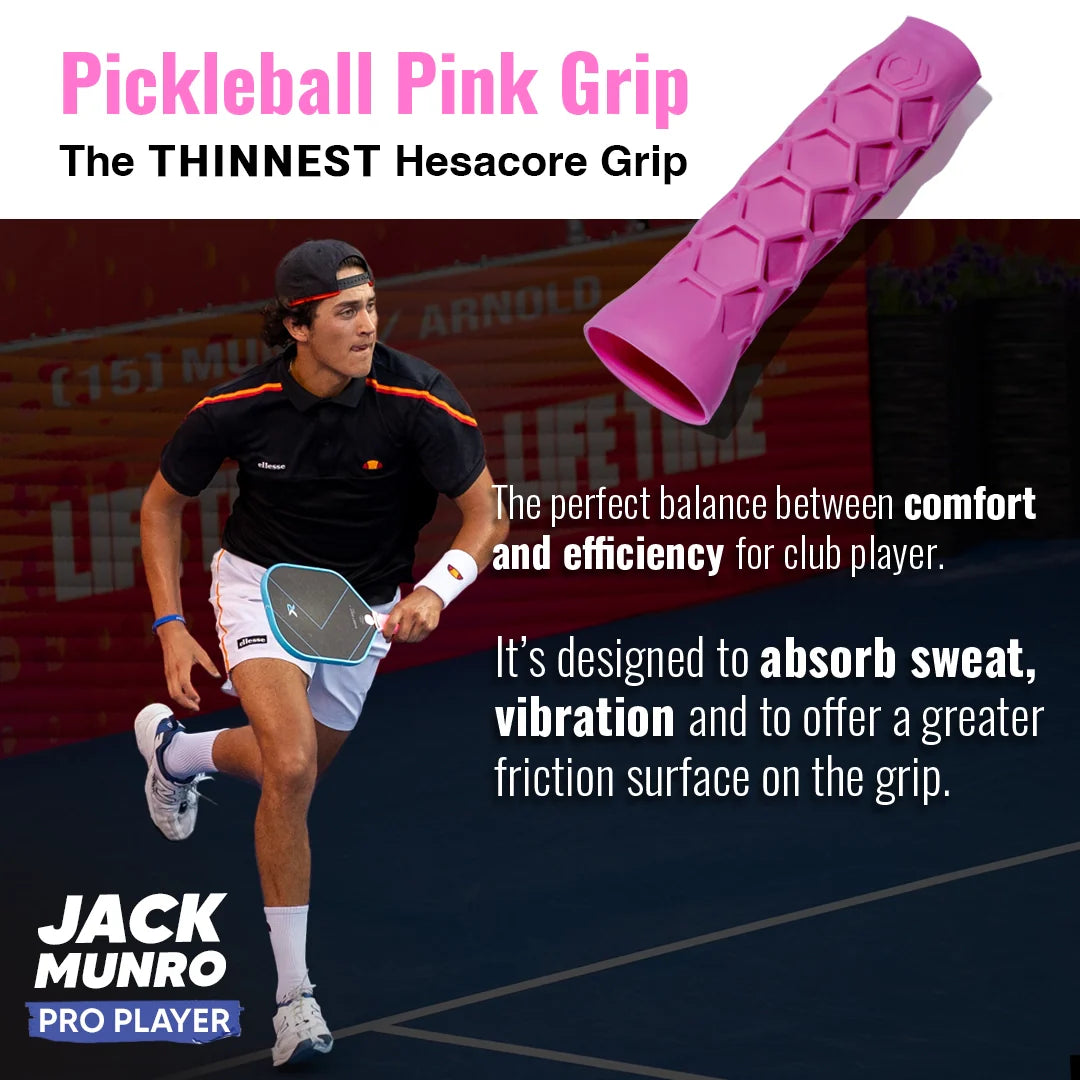 A male tennis player in white shorts and a black shirt holds a paddle on court. Above him, the Hesacore Grip Pickleball Grip (5.25", Regular Feel, Pink) is shown, featuring an ergonomic, thin design that absorbs sweat for comfort and control.