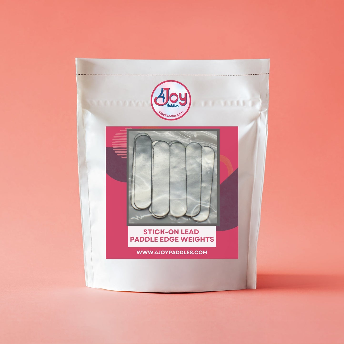 A white resealable 4Joy Paddles bag labeled "4Joy Paddle Weights" displays stick-on lead weights through a clear window. The pink label with white text and geometric accents appears on a soft coral background.