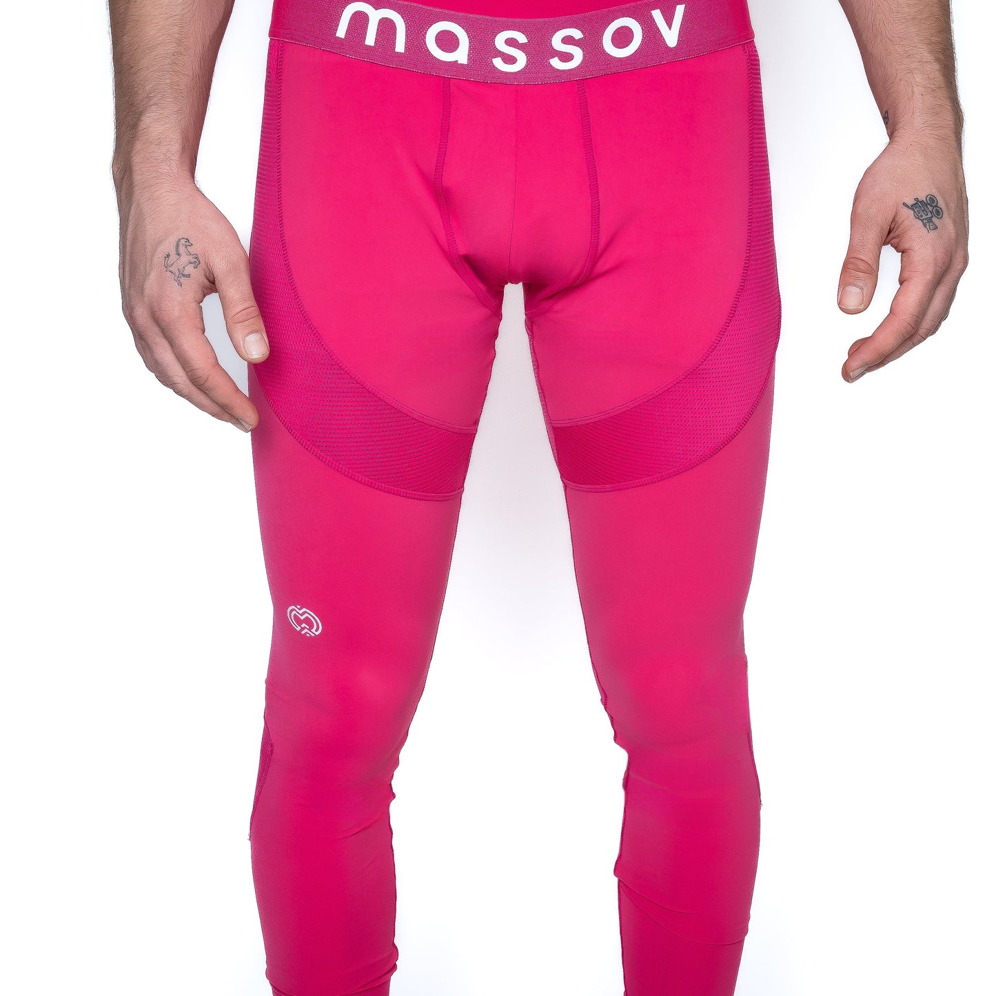 A person wears bright pink ProForm® Men's Compression Pants by Massov, featuring mesh-like thigh panels, a small white logo near the left knee, and "massov" on the waistband, with relaxed tattooed hands at their sides.
