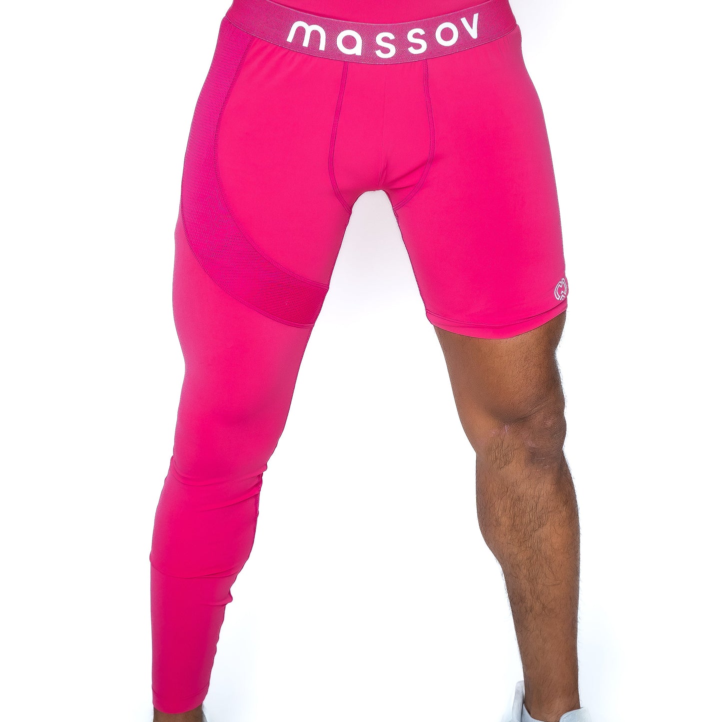 A person models Massov ProForm® Men's One Leg Compression Pants in bright pink, featuring one full-length leg and one short leg. The white waistband displays "massov." Only the lower torso and legs are shown against a white background.
