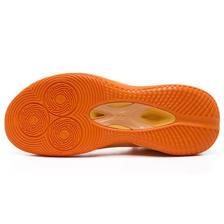 Close-up of the Rigorer BP1 “Potential” sole by BPBazaar in orange, showing three circular forefoot grips for traction, a yellow indented midfoot section, and a linear heel groove designed for enhanced grip.