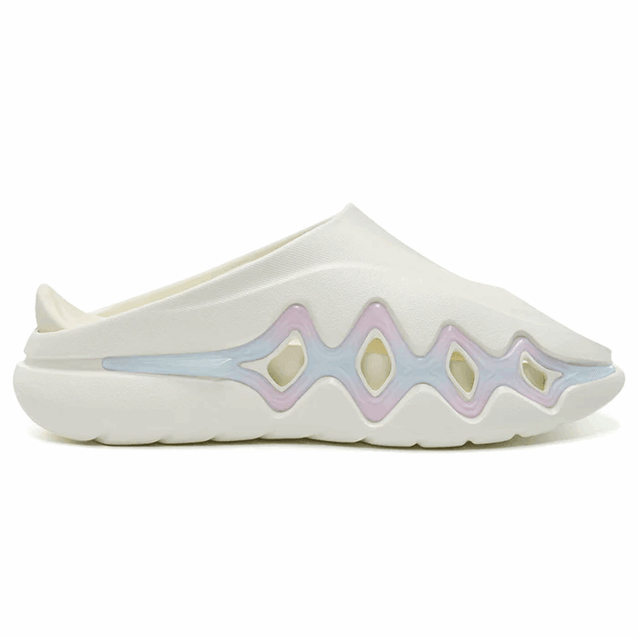 The BPBazaar Rigorer Shark 3 Slides 'White/Pink/Blue' are white slip-on clogs with a wavy sculpted sole, diamond-shaped cutouts outlined in pastel blue and pink, open back, and mule-style sneaker design for comfort.