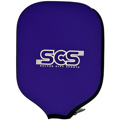 The Salted City Sports Pickleball Paddle Cover is purple with a zipper, rounded top, pointed bottom, and features the white SCS logo and "Salted City Sports" on the front for stylish paddle protection.