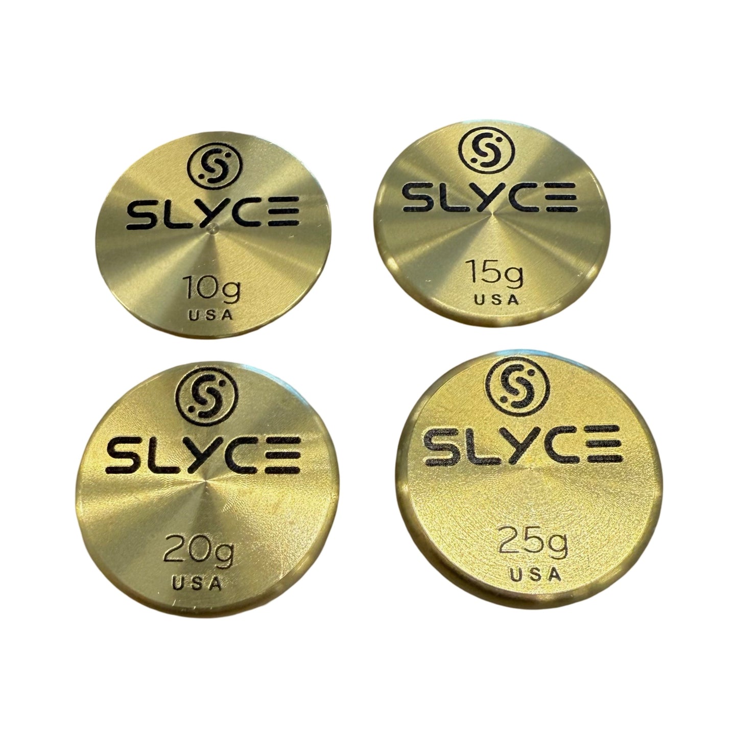 Four SLYCE SpeedCoins by Slyce Sport—round, gold-colored brass pickleball paddle handle weights—feature engraved S logos, "SLYCE," weight marks (10g, 15g, 20g, 25g), a brushed finish, and “USA” at the bottom.