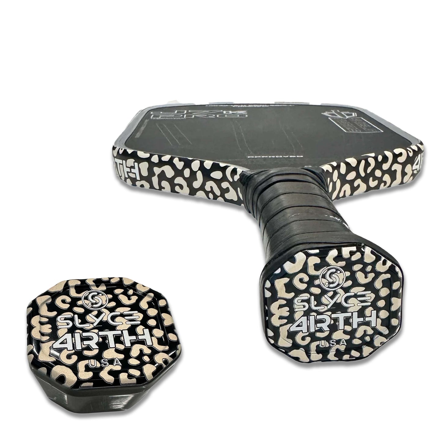 The Slyce Sport Special Edition 4rth Cheetah Black SpeedCap (28g, 1.0 oz.) Paddle Performance Enhancer features bold white leopard print accents and grip tape, plus “SLYCE 4RTH USA” in white lettering for a sleek, high-performance look.