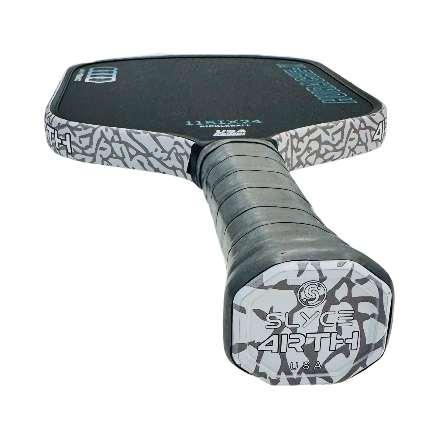 A close-up of the Slyce Sport Special Edition 4rth Elephant Print SpeedCap Paddle Performance Enhancer highlights its black grip tape, replacement cap, and white-gray abstract branding on the edge and end cap. Weight: 28g (1.0 oz).