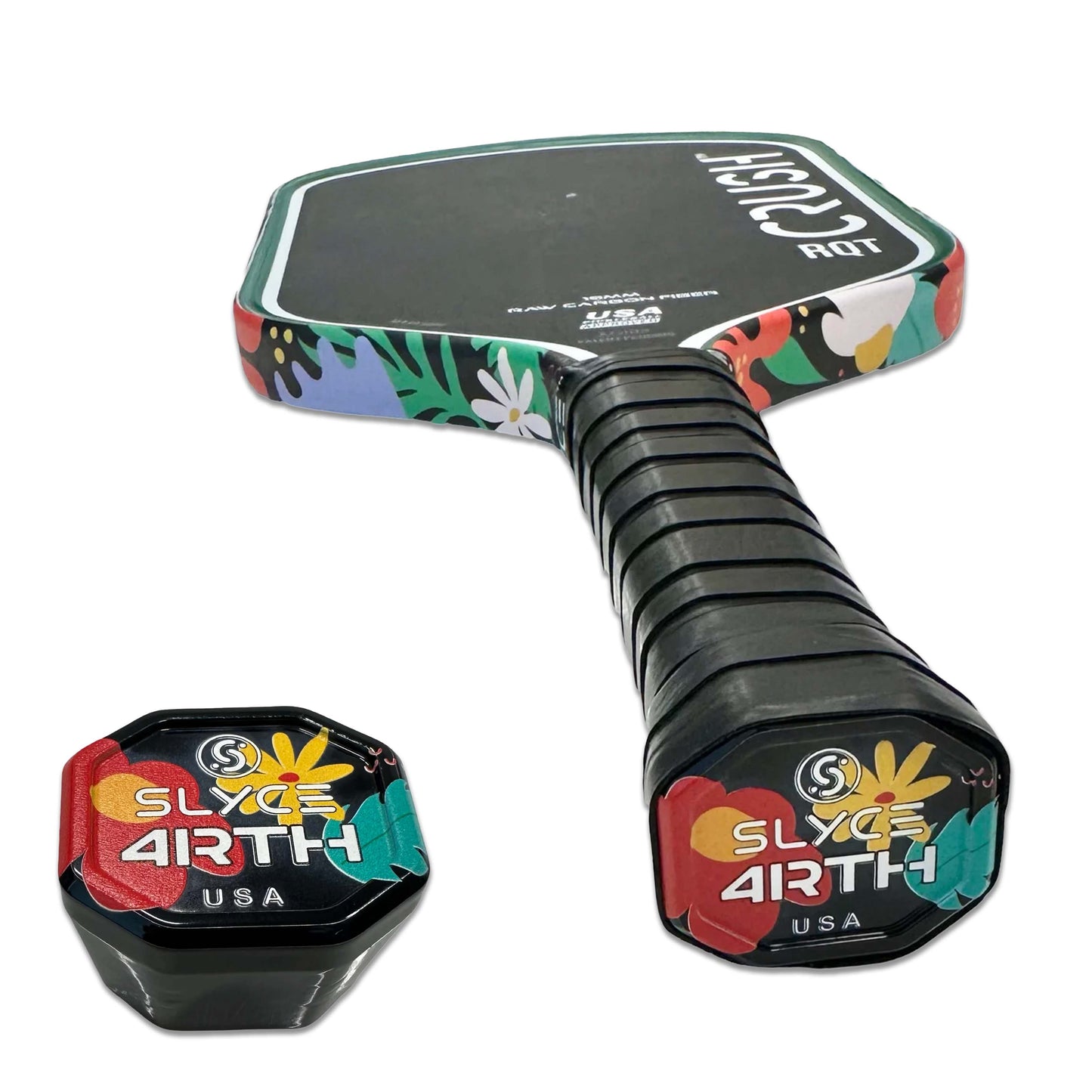A colorful pickleball paddle by Slyce Sport features floral-patterned edges, a black face, and a 6061 aircraft aluminum grip cap with the “SLYCE 4RTH USA” logo. Nearby sits the matching Special Edition 4rth Floral SpeedCap Paddle Performance Enhancer (28g).