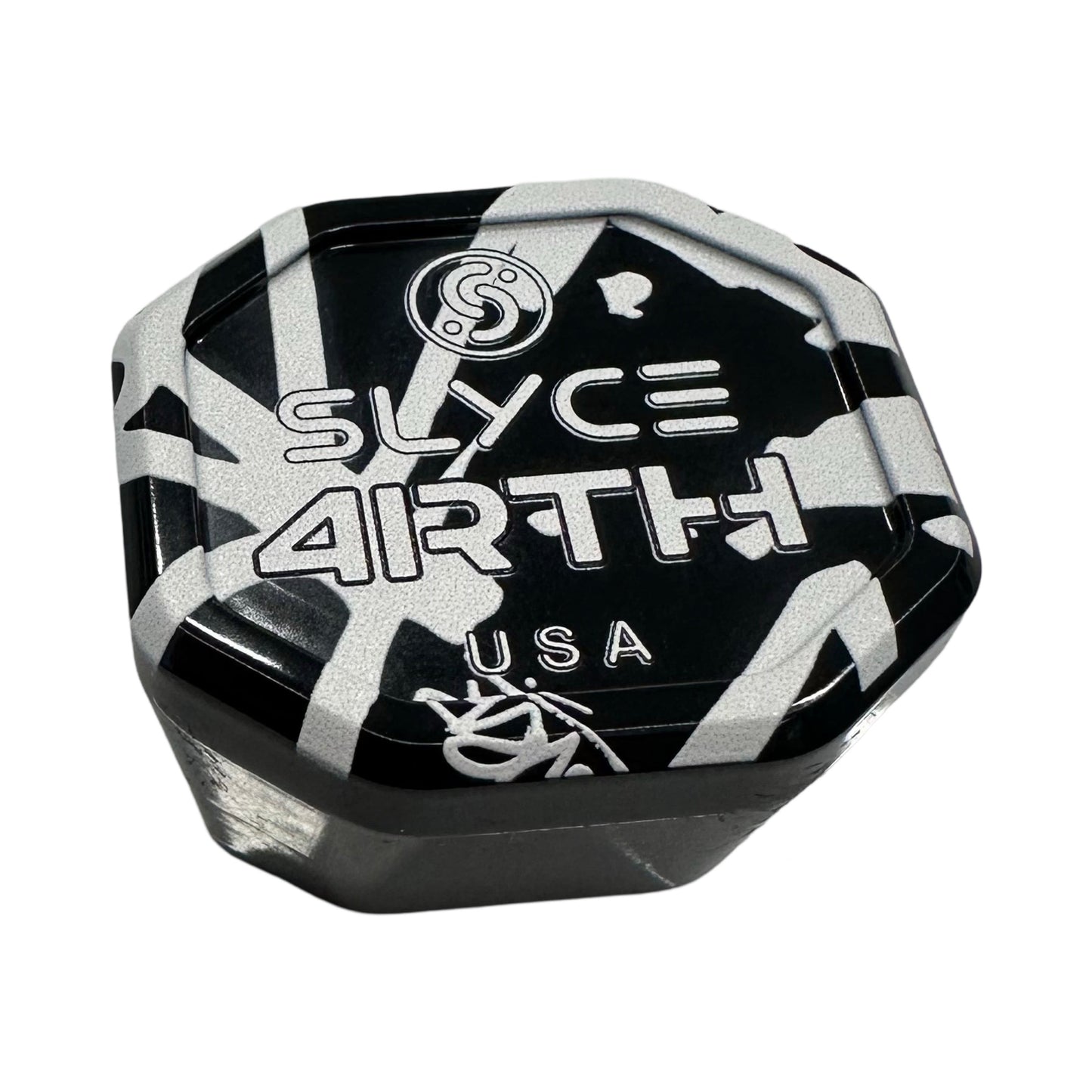 A small, black hexagonal container with white graffiti and bold text reading “Slyce Sport”—ideal for storing your Special Edition 4rth Graffiti White SpeedCap (28g, 1.0 oz.) Paddle Performance Enhancer or other pickleball accessories.