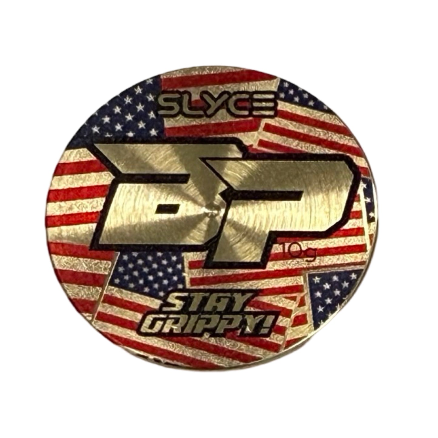 A round solid brass disc from Slyce Sport, engraved with a “BP” logo over overlapping American flags, reads “SLYCE” above and “STAY GRIPPY!” below—this is the Special Edition Bodhi Patriot SpeedCoins Paddle Handle Weight.