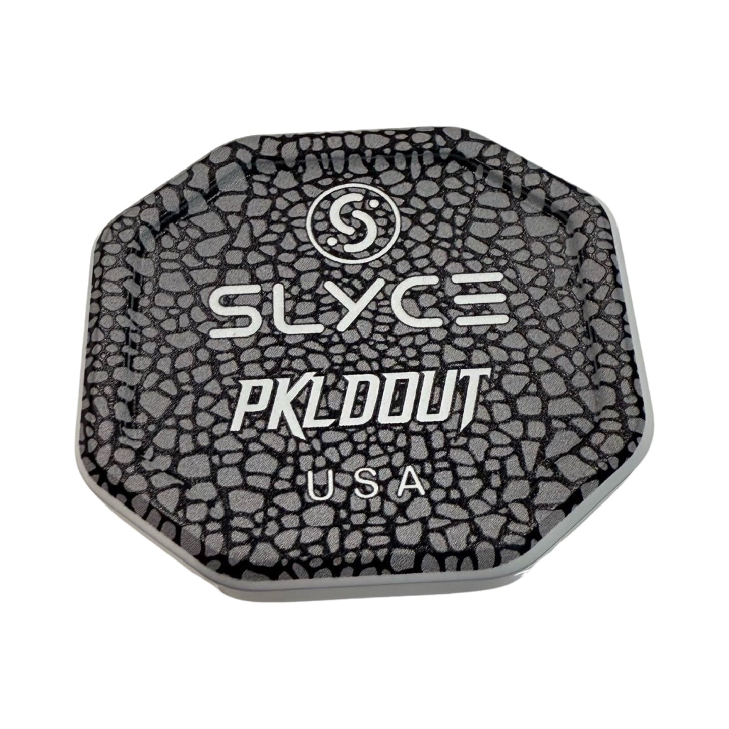 The Slyce Sport Special Edition PKLDOUT Elephant SpeedCap (28g, 1.0 oz.) is a black, octagonal paddle grip cap with a textured cracked pattern and white PKLDOUT graphics—an eye-catching replacement accessory.