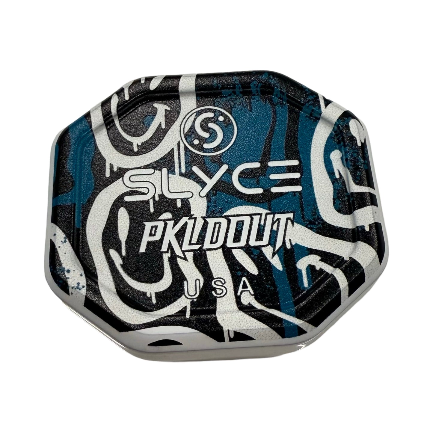 The Special Edition PKLDOUT Smiles SpeedCap (28g) by Slyce Sport features an octagonal metallic tin with blue, black, and white graffiti art, bold SLYCE and PKLDOUT logos, plus "USA"—perfect for your pickleball paddle grip cap.