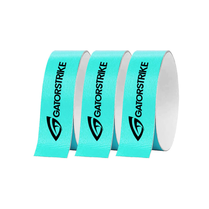 Three rolls of GATORSTRIKE™ Edge Guard Tape - 3 Pack stand upright, each with the black GATORSTRIKE logo and “GT” emblem. Perfect for protecting pickleball paddle edges. Rolls are bright aqua with white inner sides on a white background.