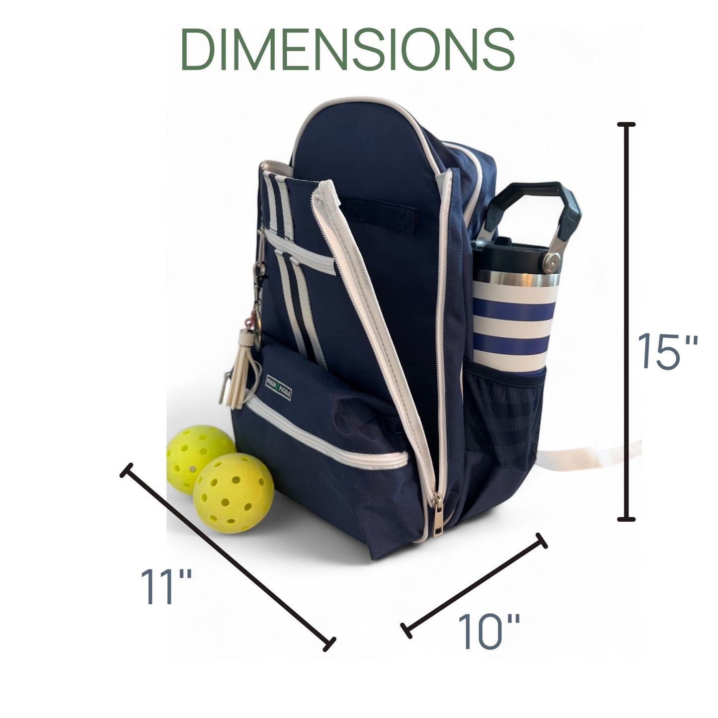 The Fresh Pickle Teddi Pickleball Backpack in navy blue with white zippers stands upright. A striped tumbler is in the side pocket, two yellow balls are beside it, and black lines highlight its roomy 15”H x 11”W x 10”D interior. “DIMENSIONS” is above.