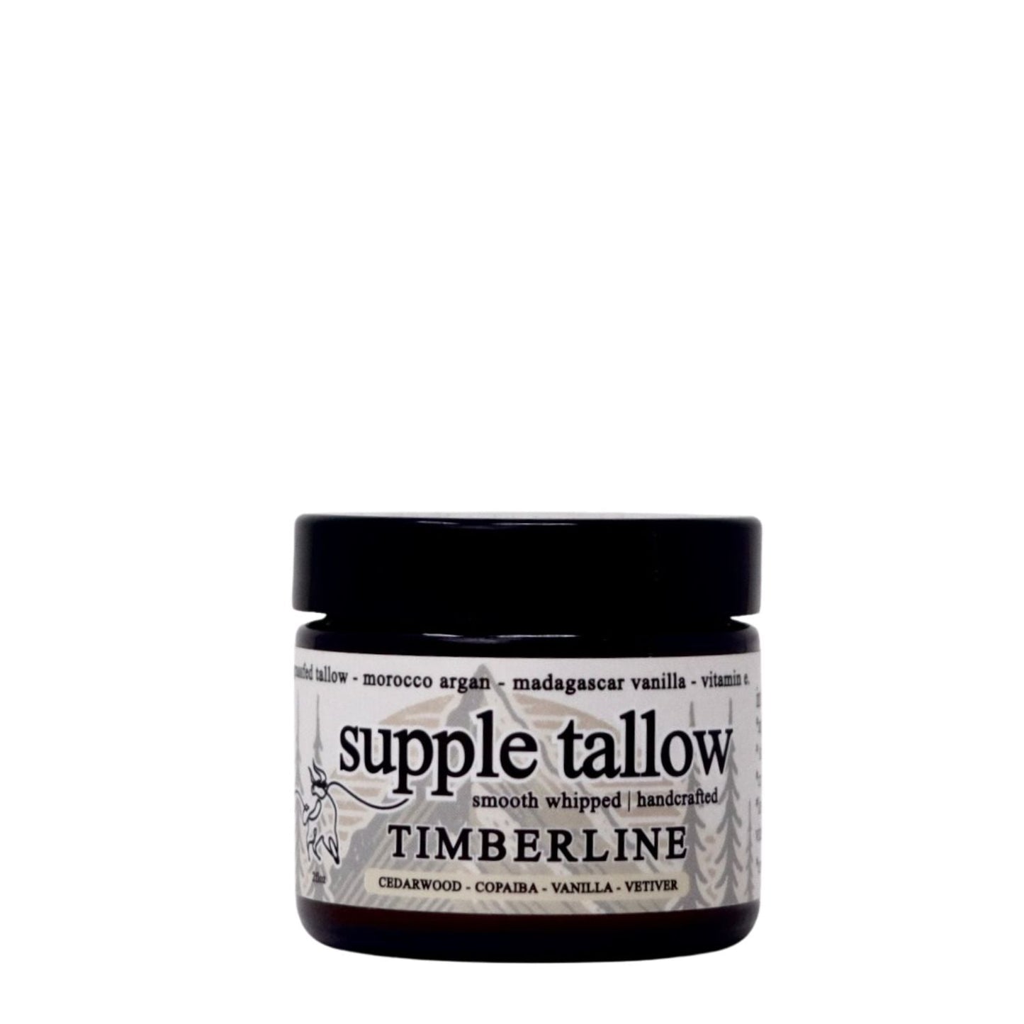 A small dark jar labeled "supple tallow salve" by Roots Apothecary features a forest graphic and highlights grassfed tallow with organic cedarwood, copaiba, vanilla, and vetiver in a smooth whipped, handcrafted formula.