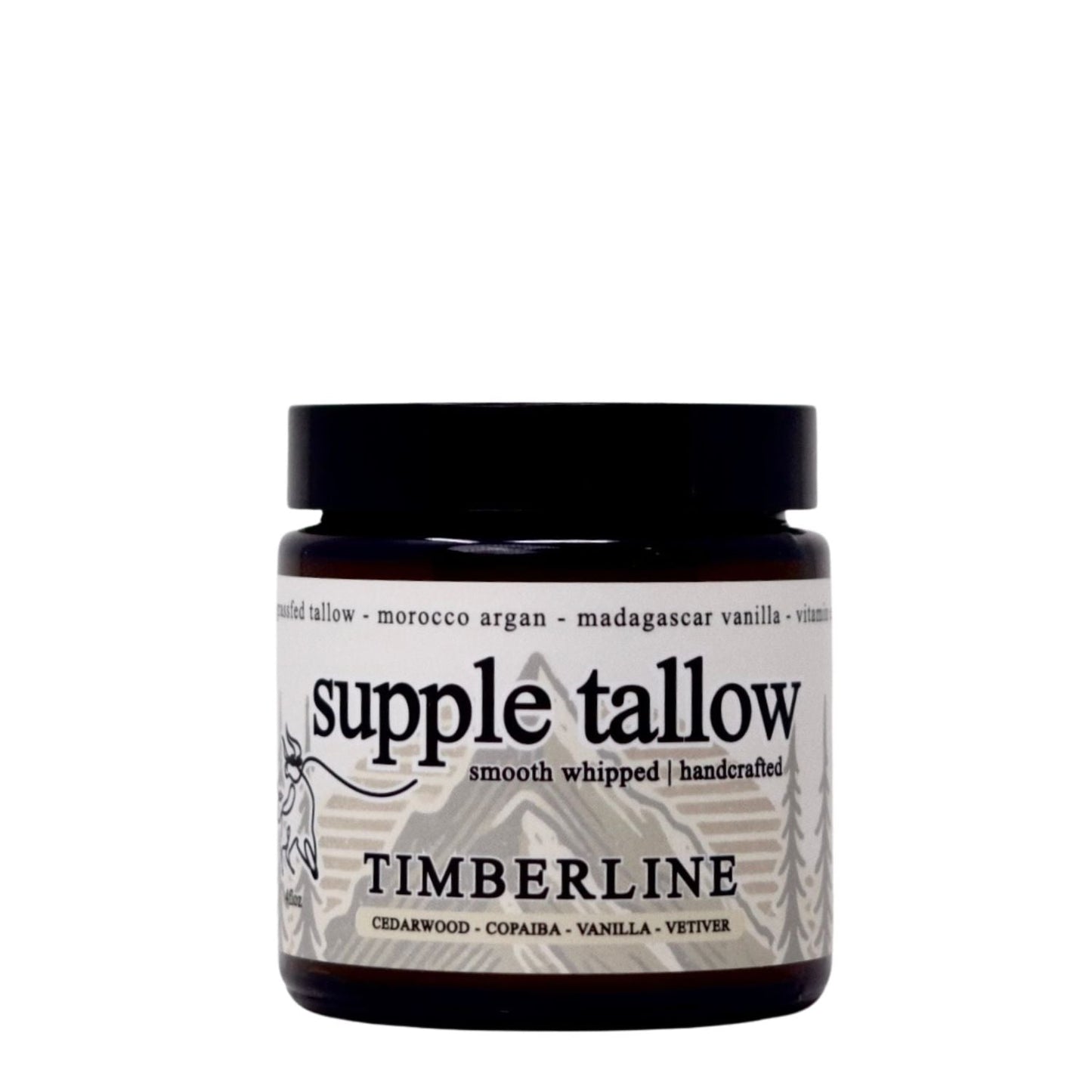 A dark jar of Roots Apothecary supple tallow salve, smooth whipped and handcrafted with grassfed tallow and Moroccan argan oil. The Timberline scent—cedarwood, copaiba, vanilla & vetiver—reflects its natural organic skincare formula.