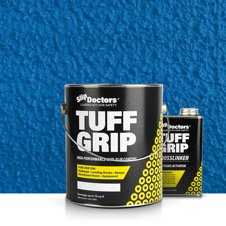 A large black SlipDoctors Tuff Grip Aggressive Traction Non-Skid Floor Paint can stands before a smaller Tuff Grip Crosslinker on a bright blue textured surface, highlighting this high-traction coating for floors and equipment.