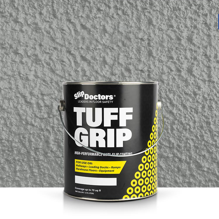 A large can labeled SlipDoctors Tuff Grip Extreme - Aggressive Traction Non-Skid Floor Paint sits on a white surface, featuring black, yellow, and white colors and promoting its use as a high-performance anti-slip coating for floors and ramps.