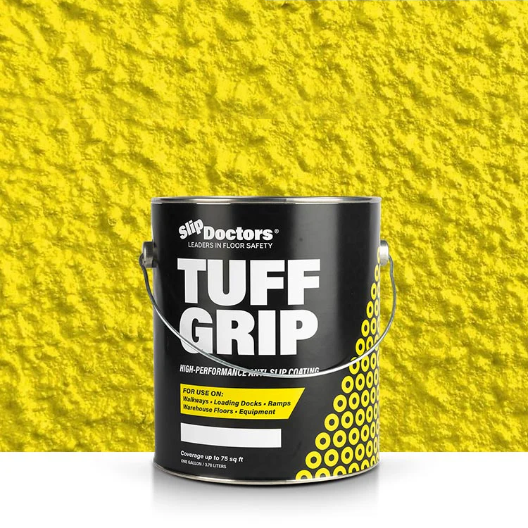 A black can of SlipDoctors Tuff Grip Extreme Aggressive Traction Non-Skid Floor Paint sits on a white surface, labeled as a high-performance anti-slip coating for walkways, ramps, loading docks, and warehouse floors. A yellow textured wall is behind it.