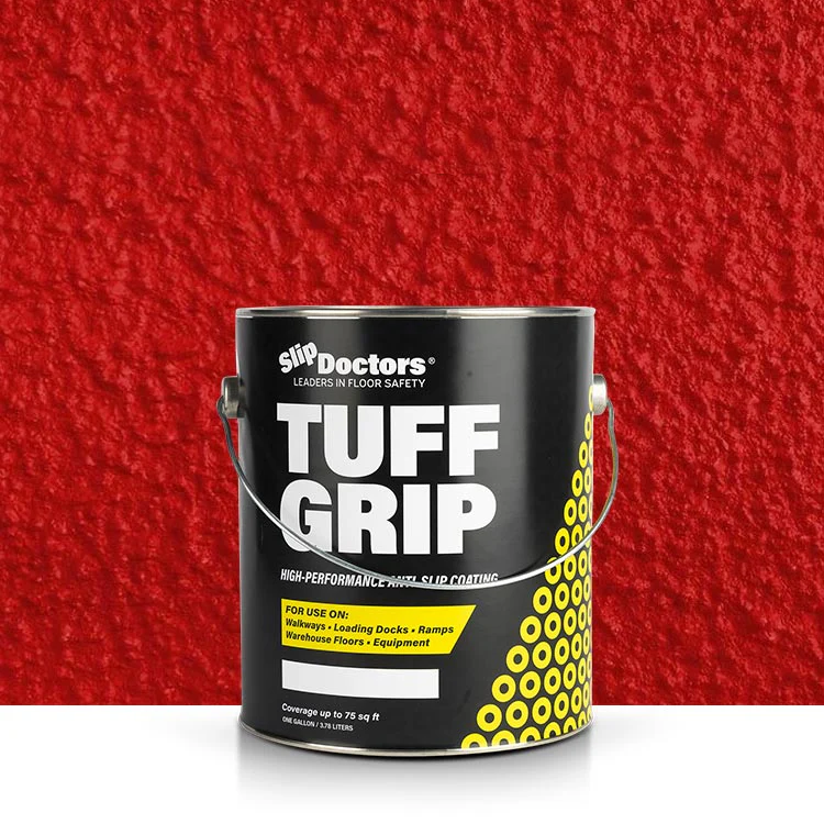 A black and yellow SlipDoctors Tuff Grip can sits on a white surface before a red wall, highlighting its aggressive traction, non-skid floor paint for various surfaces with an anti-slip coating.