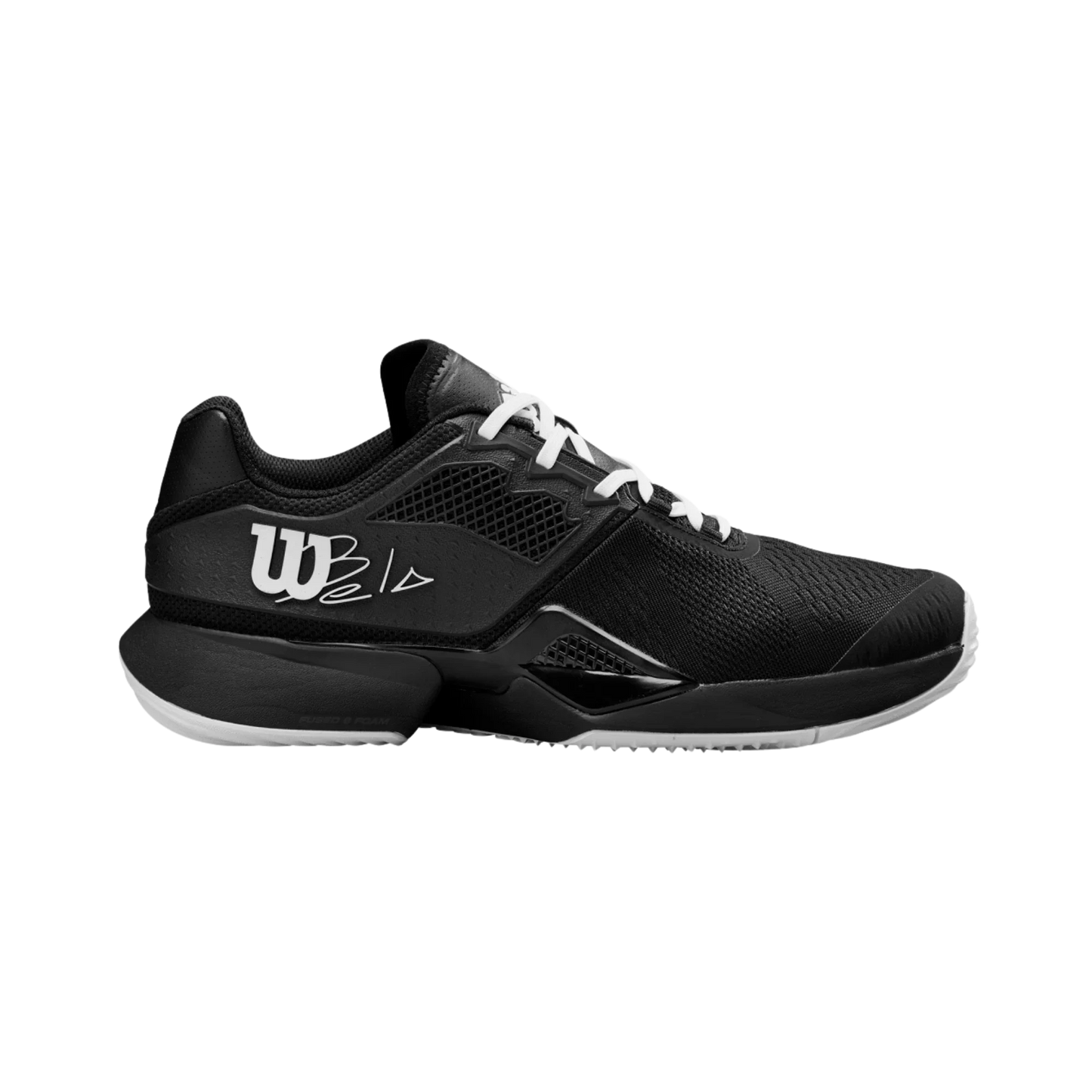 The Wilson Bela Tour Men's Padel Shoes from Padel USA feature a modern black design with white laces, a white sole, mesh and synthetic materials, and a large W logo—blending style and performance inspired by Bela Tour padel footwear.