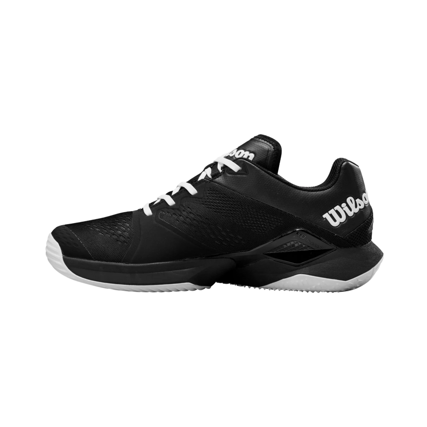 The Wilson Bela Tour Men's Padel Shoes by Padel USA are black with white accents, featuring white laces, a textured rubber sole, and the Wilson logo in white on the heel and tongue, shown in a side profile against a plain white background.