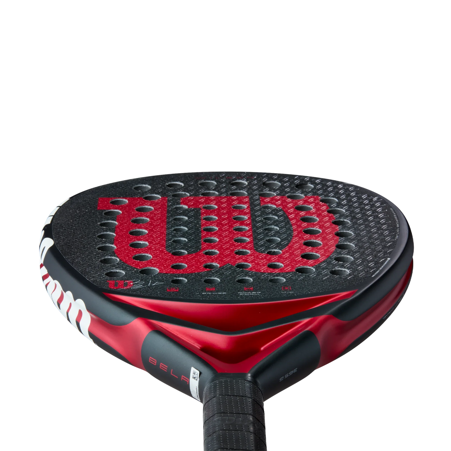 Close-up of the Wilson Bela V3 Padel Racket by Padel USA, featuring a black and red 24K carbon face with a bold red "W" logo and evenly spaced holes. The textured black handle stands out against a plain white background.
