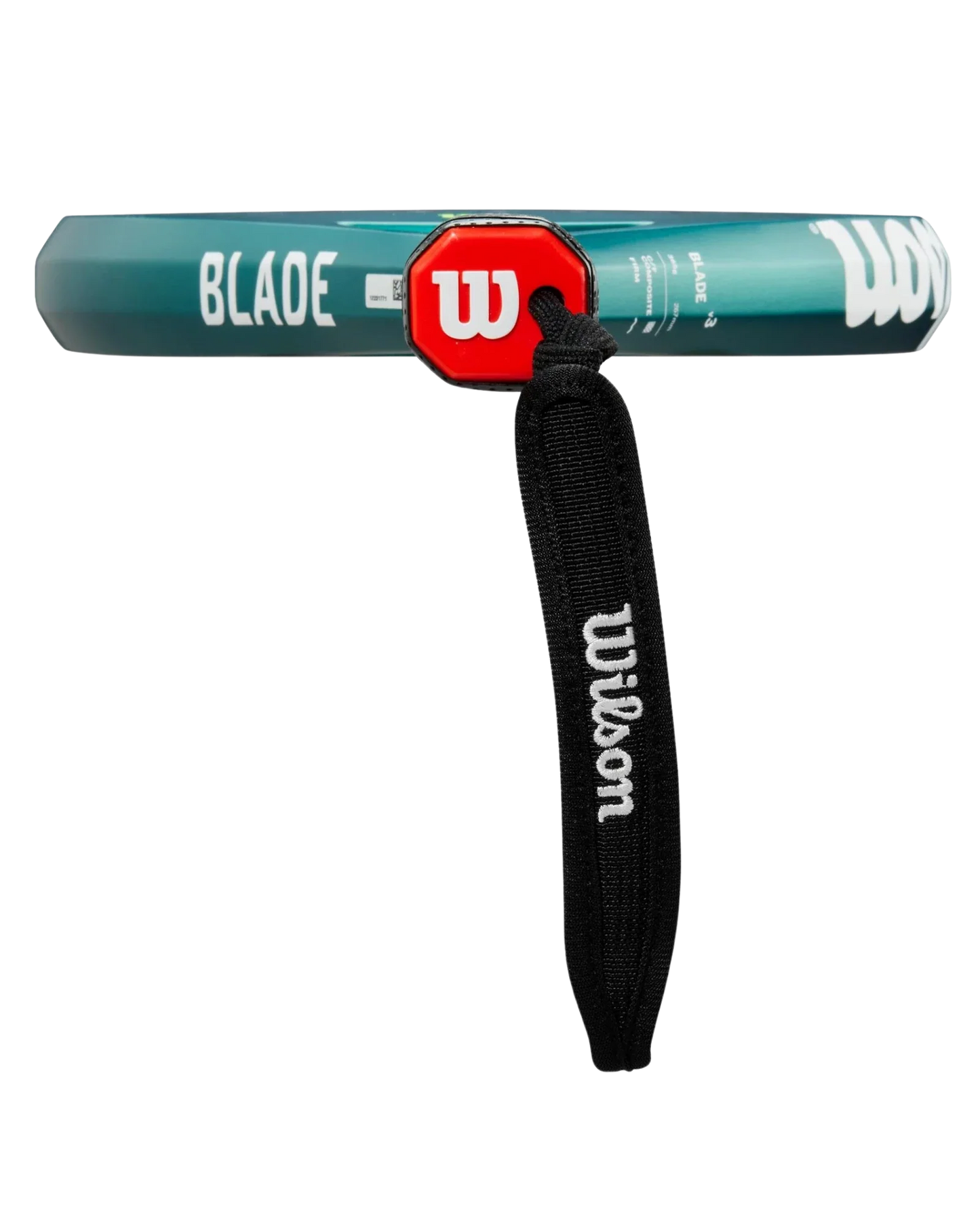 A close-up of the Wilson Blade V3 from Padel USA shows the red W logo on its handle, a black wrist strap with “Wilson” in white, and a green frame labeled “BLADE,” highlighting its Carbon Fiberglass Composite build.