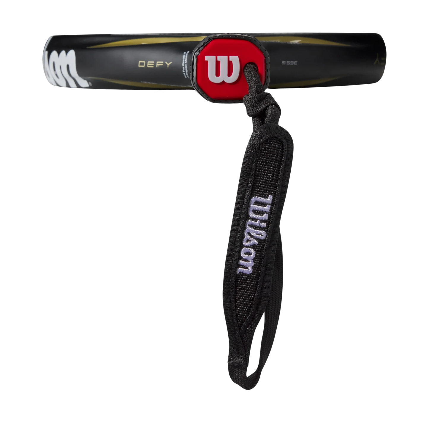 The Wilson Defy V1 Padel Racket from Padel USA features a black handle, red cap with white W logo, 3K Carbon Face, and black wrist strap with white “Wilson” text. “DEFY” is printed in gold on the side against a plain white background.