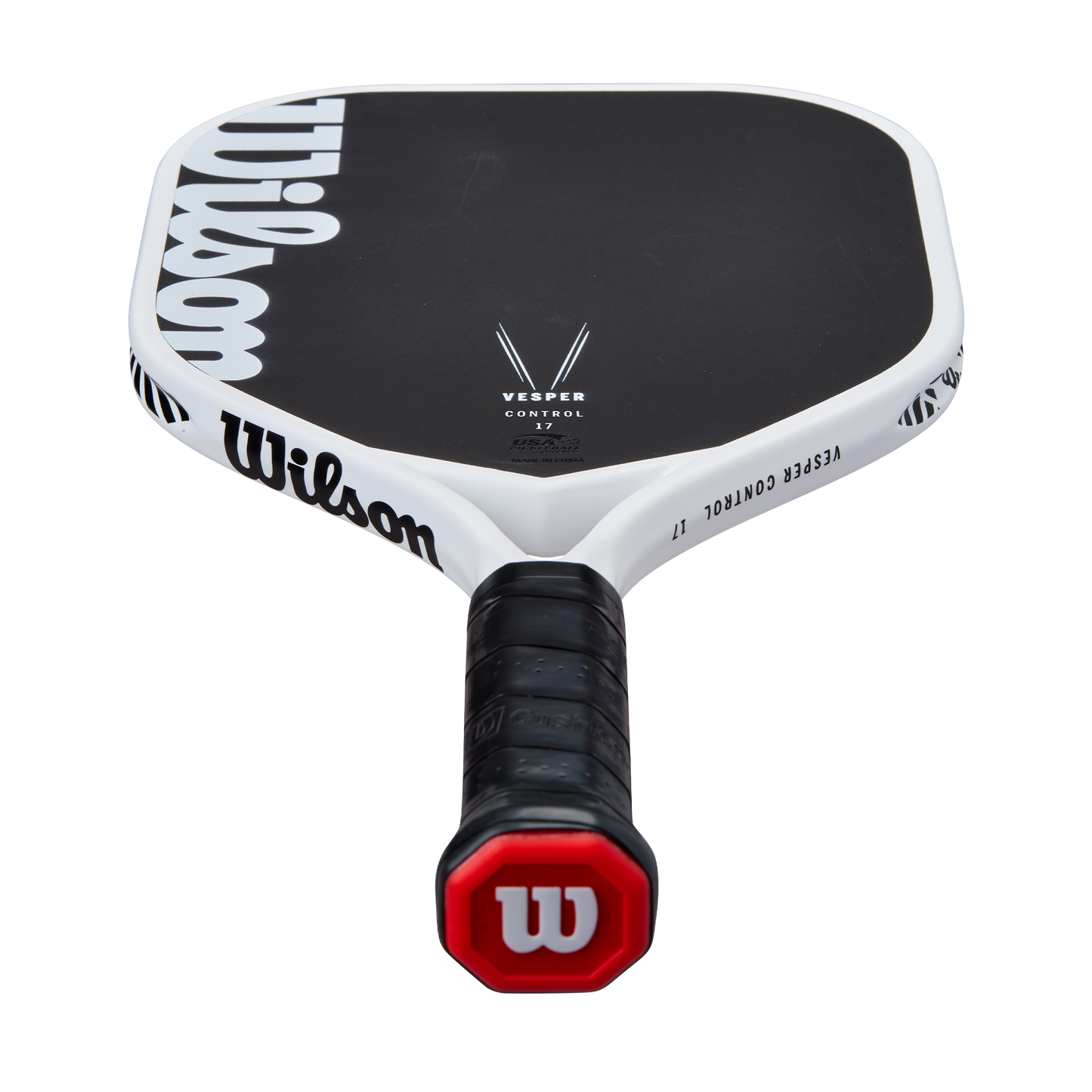 A close-up of the Royal Pickleball Wilson Vesper Control 17MM paddle shows its black carbon fiber face with a large white W logo, Vesper Control label, black handle with red cap, and white W logo, set against a plain white background.