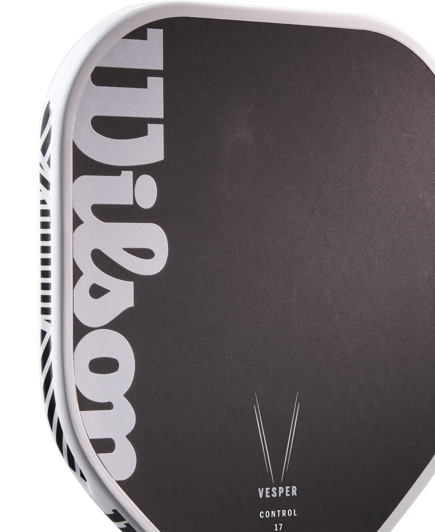 Close-up of the Royal Pickleball Wilson Vesper Control 17MM paddle, featuring a black and white carbon fiber design with clean lines, geometric accents, and white VESPER CONTROL 17MM branding near the bottom.